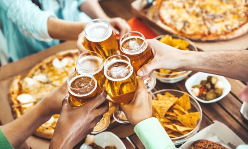 People holding beers